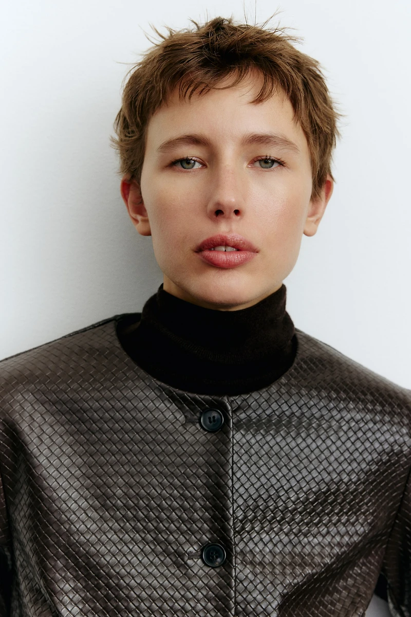 Veste en tissu enduit