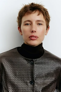 Veste en tissu enduit