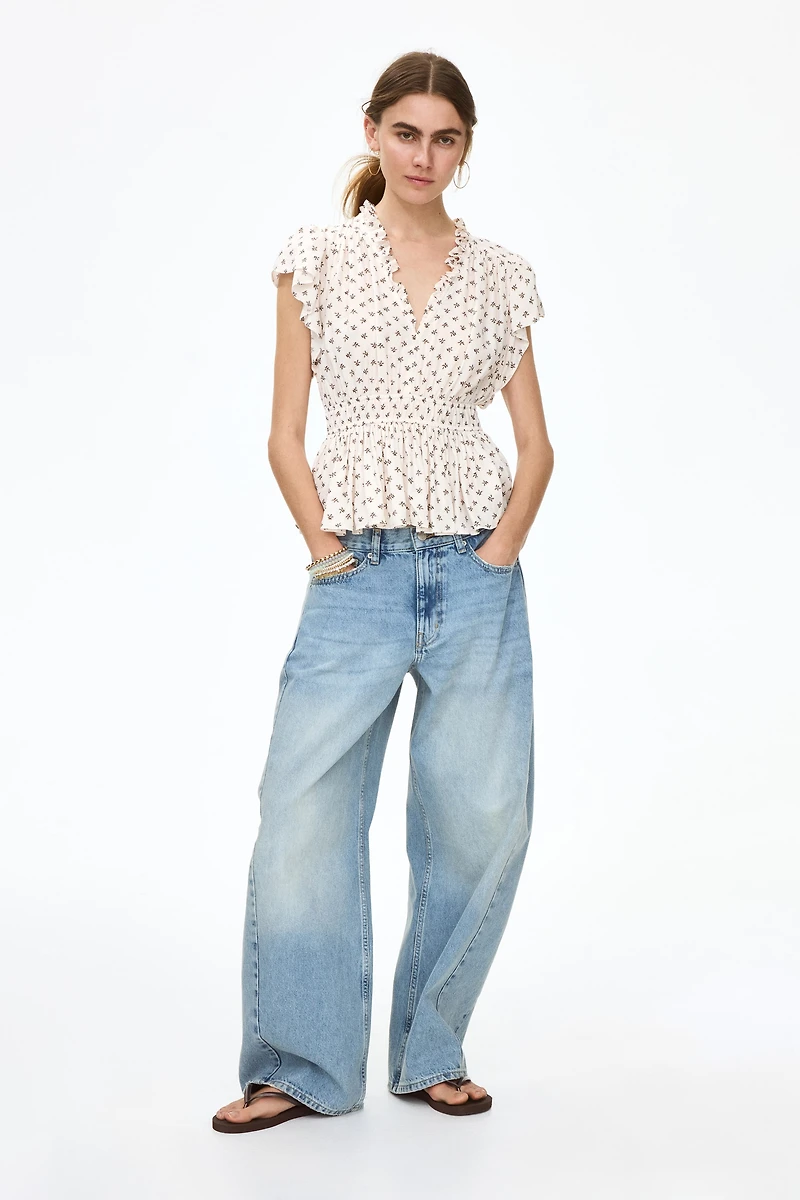 Flutter-Sleeved Peplum Blouse
