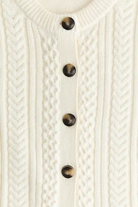 Chandail sans manches en tricot torsadé