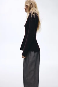 Haut péplum en tricot côtelé