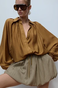Chemise ample à cordons de serrage