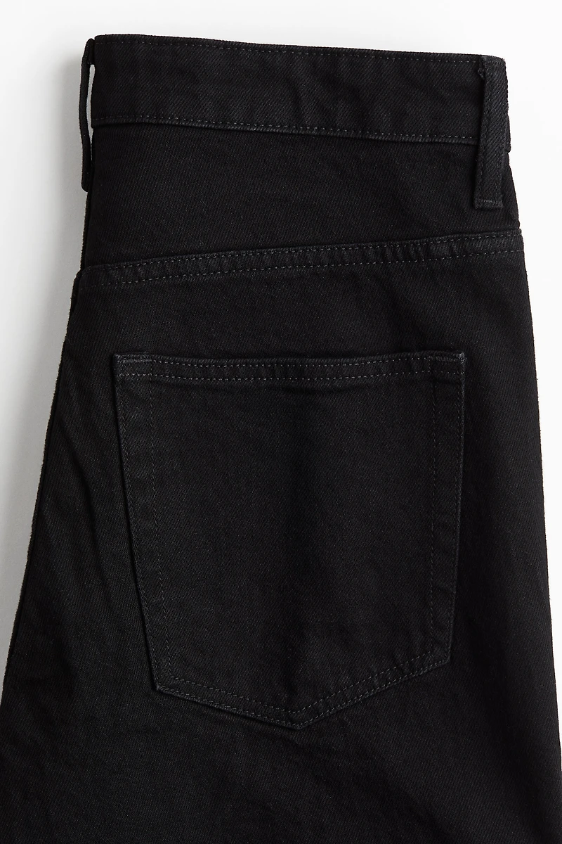 Jean taille haute jambes semi-évasées