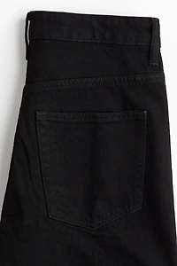 Jean taille haute jambes semi-évasées