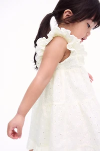 Robe à volant avec broderie anglaise