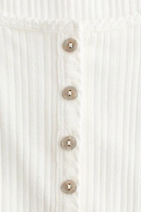 Haut en tricot pointelle