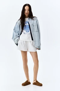 Short taille haute avec broderie anglaise