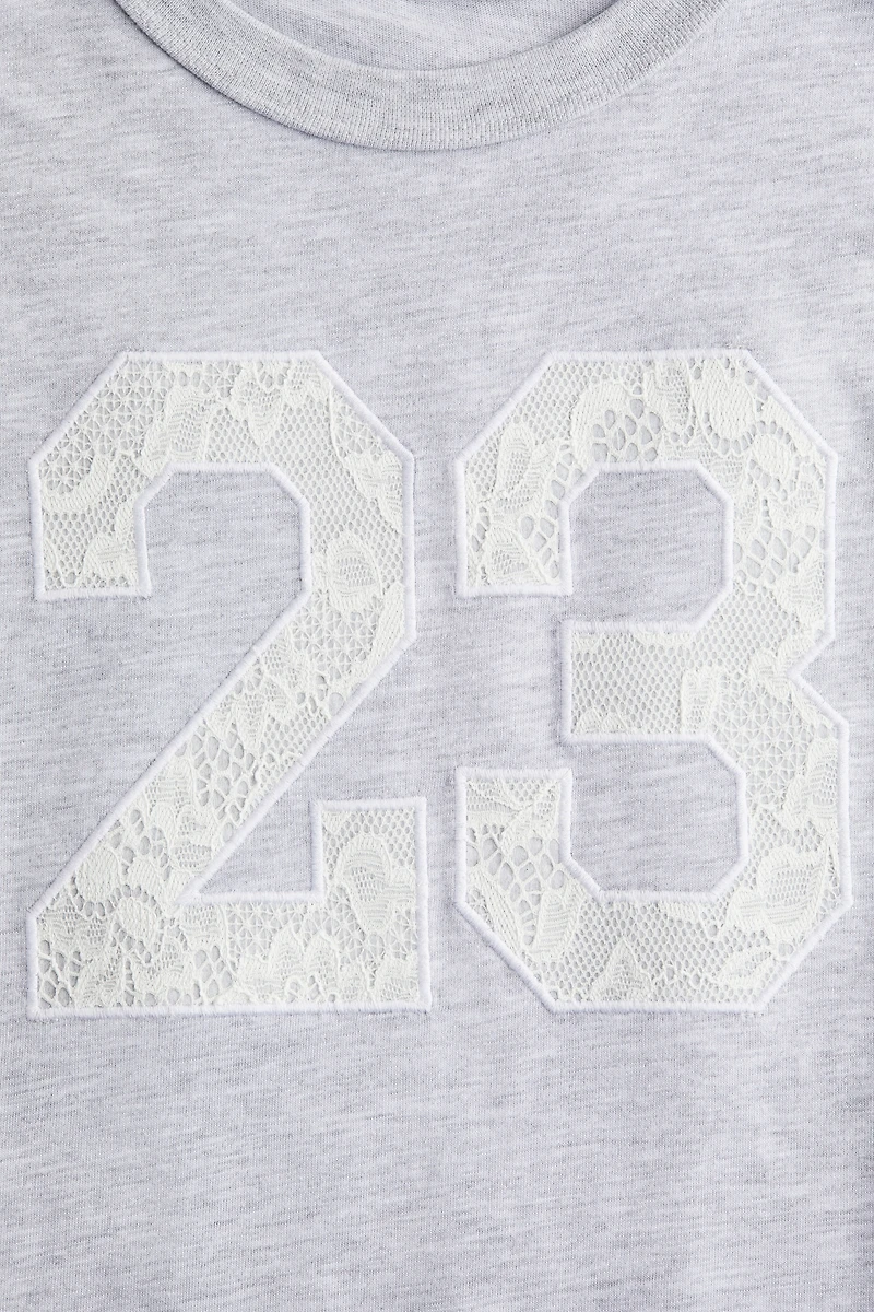 T-Shirt with Text Design