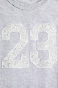 T-Shirt with Text Design
