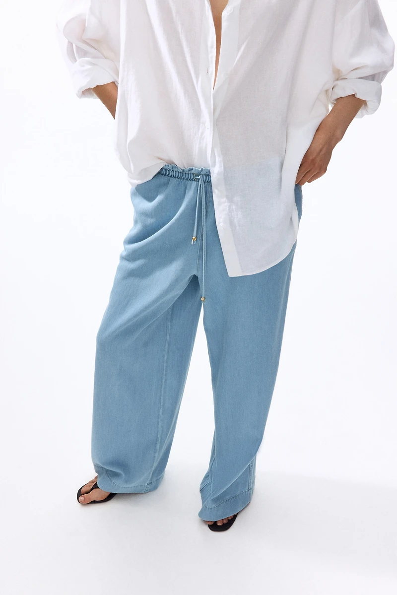 Pantalon taille froncée à jambes larges