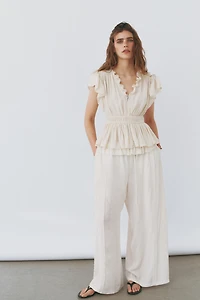 Flutter-Sleeved Peplum Blouse