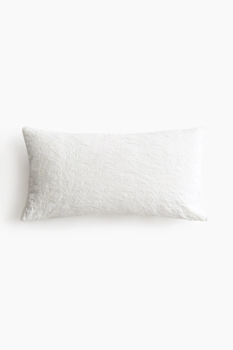 Housse de coussin en tissu jacquard