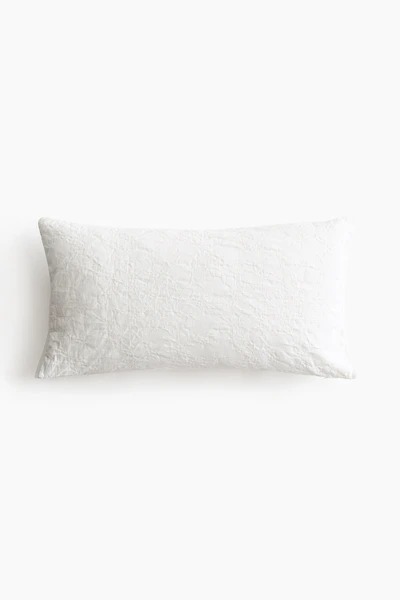 Housse de coussin en tissu jacquard