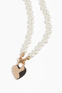 Collier de perles fantaisie avec pendentifs