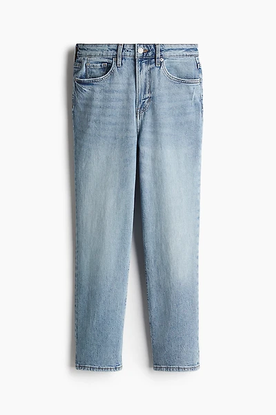 Jean taille haute à la cheville et près du corps