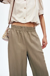 Wide-Leg Ruffle-Trimmed Pants