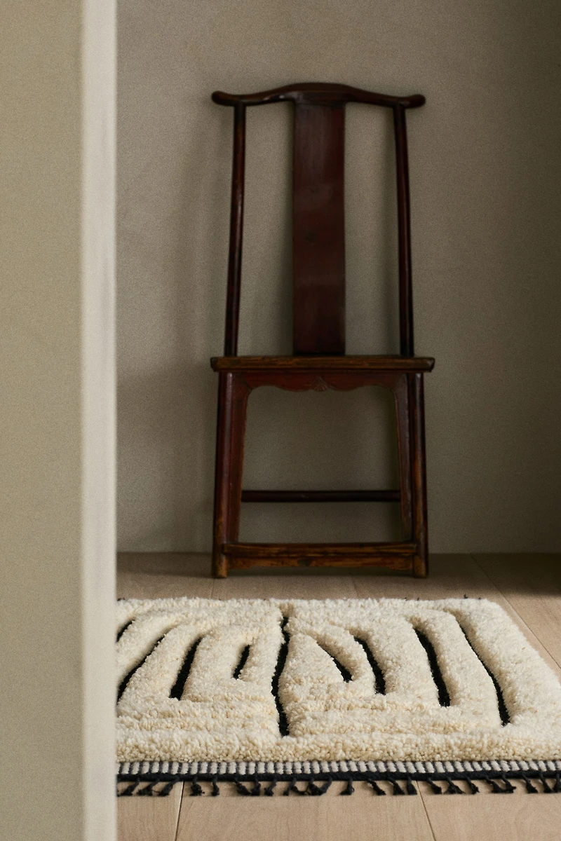 Fringed wool-blend rug