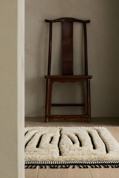 Fringed wool-blend rug