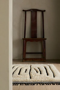Fringed wool-blend rug