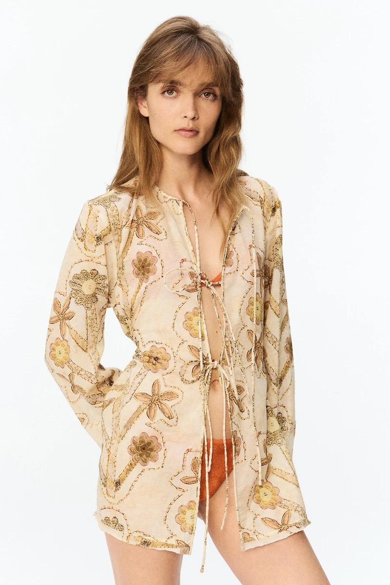 Blouse à nouer avec imprimé fleuri