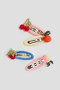 Lot de 4 barrettes avec appliqué