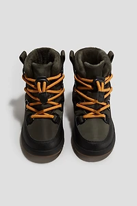 Bottines imperméables et chaudement doublées