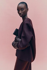 Haut fait main en laine mélangée