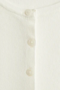 Gilet à manches courtes en fin tricot