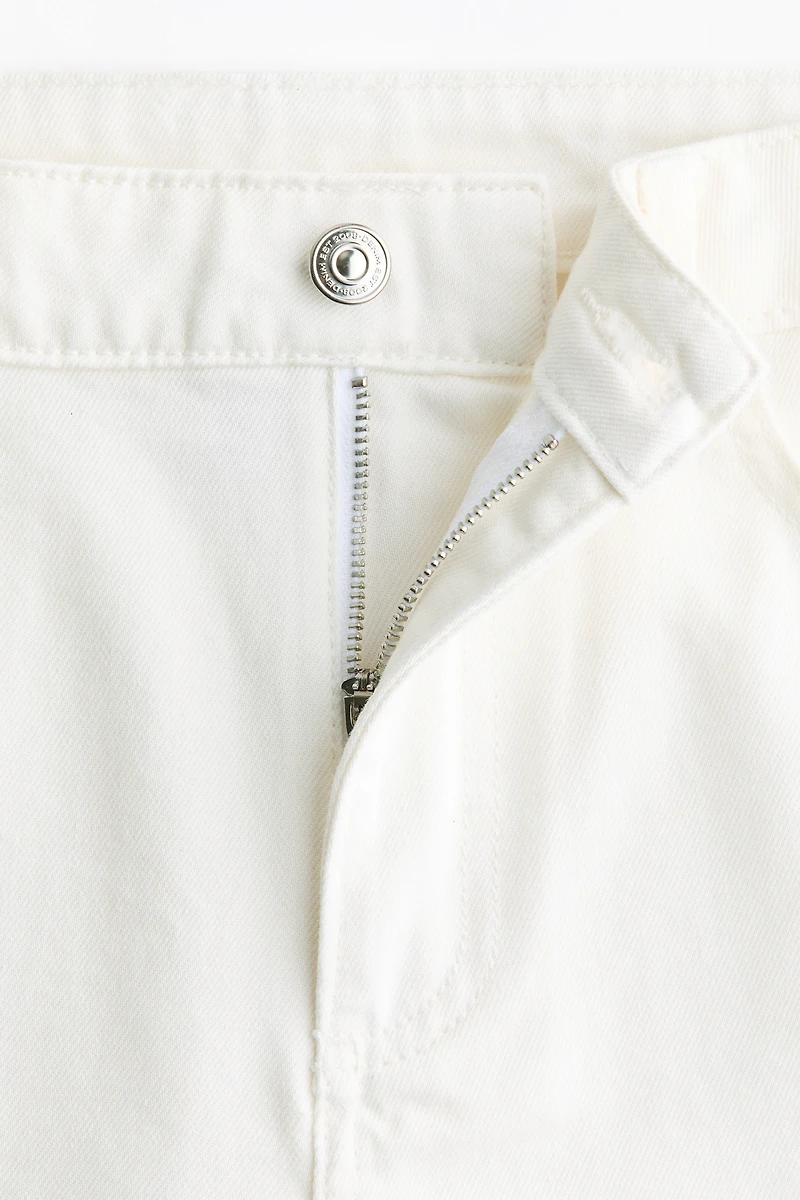 Raw-edge denim shorts