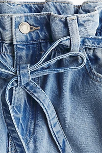 Jean large à ceinture plissée