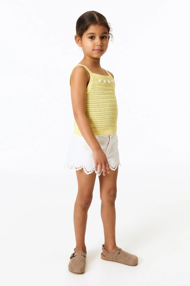 Haut ornementé en tricot