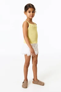 Haut ornementé en tricot