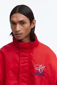 Veste de survêtement brodée ample en nylon