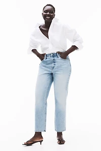 Jean taille haute à la cheville et près du corps