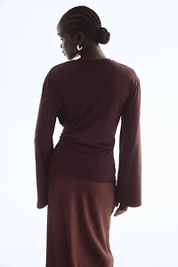 Haut avec détail à nouer