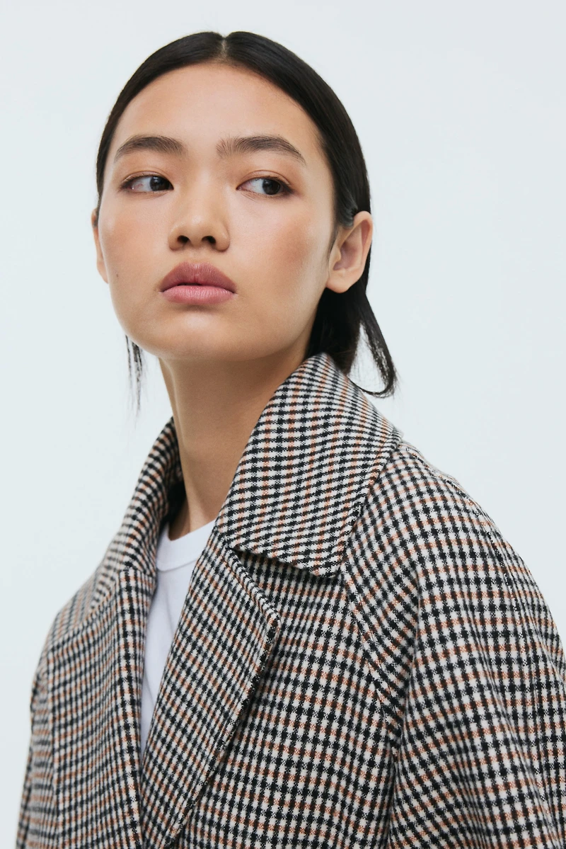 Manteau avec ceinture à nouer