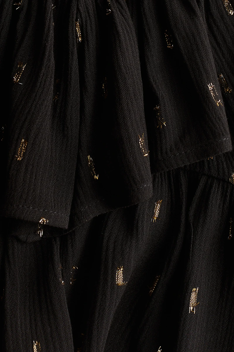 Jupe smockée à volants