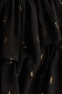 Jupe smockée à volants