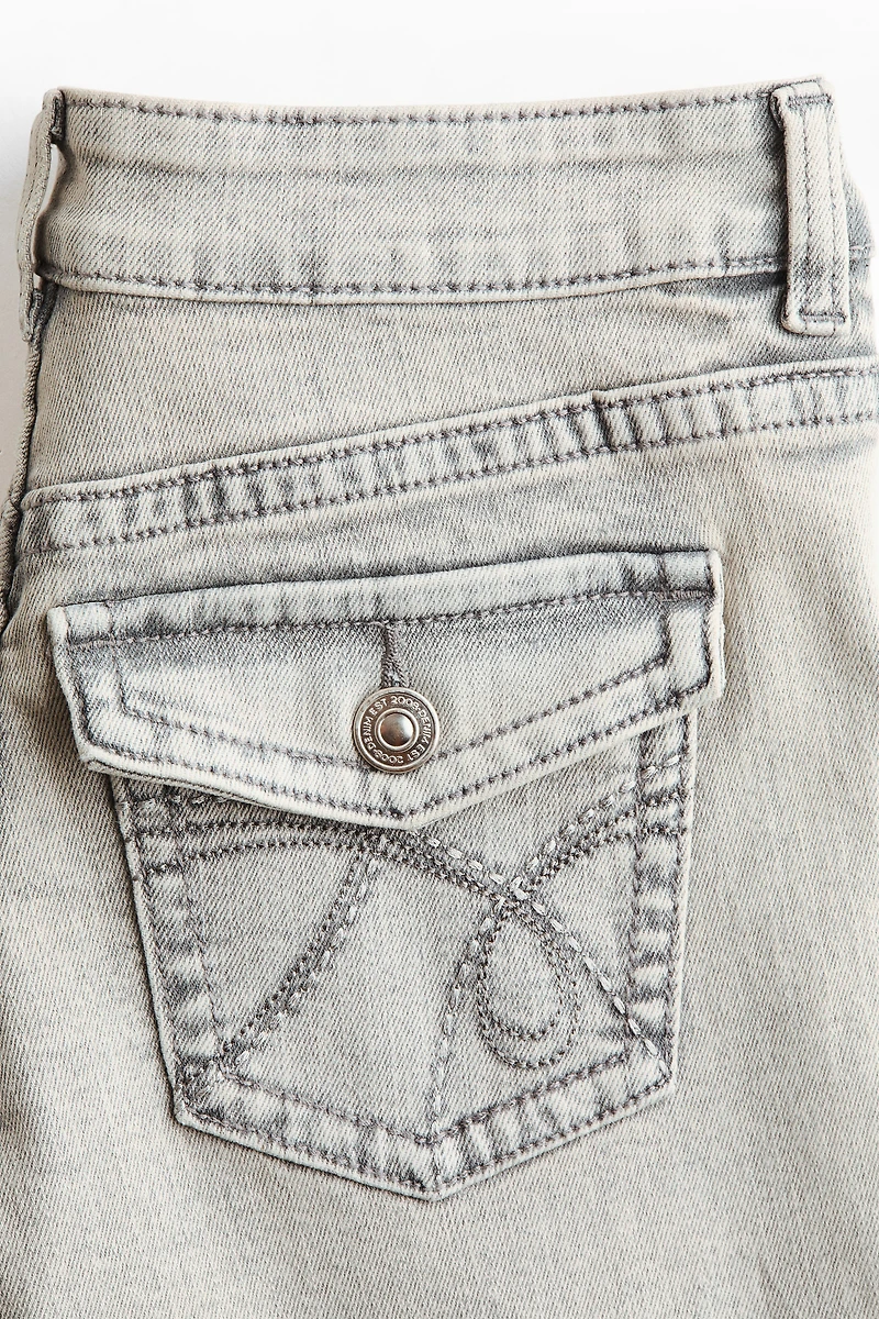 Jean taille basse jambes évasées