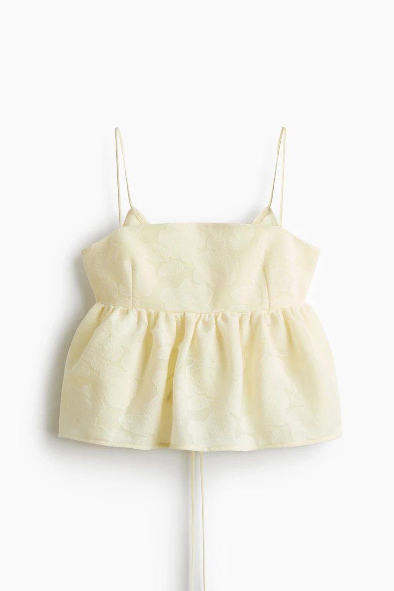 Haut péplum en tissu jacquard