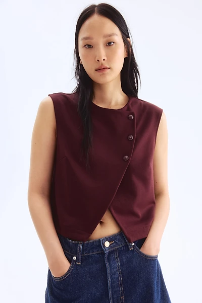 Gilet sans manches croisé à fermeture asymétrique