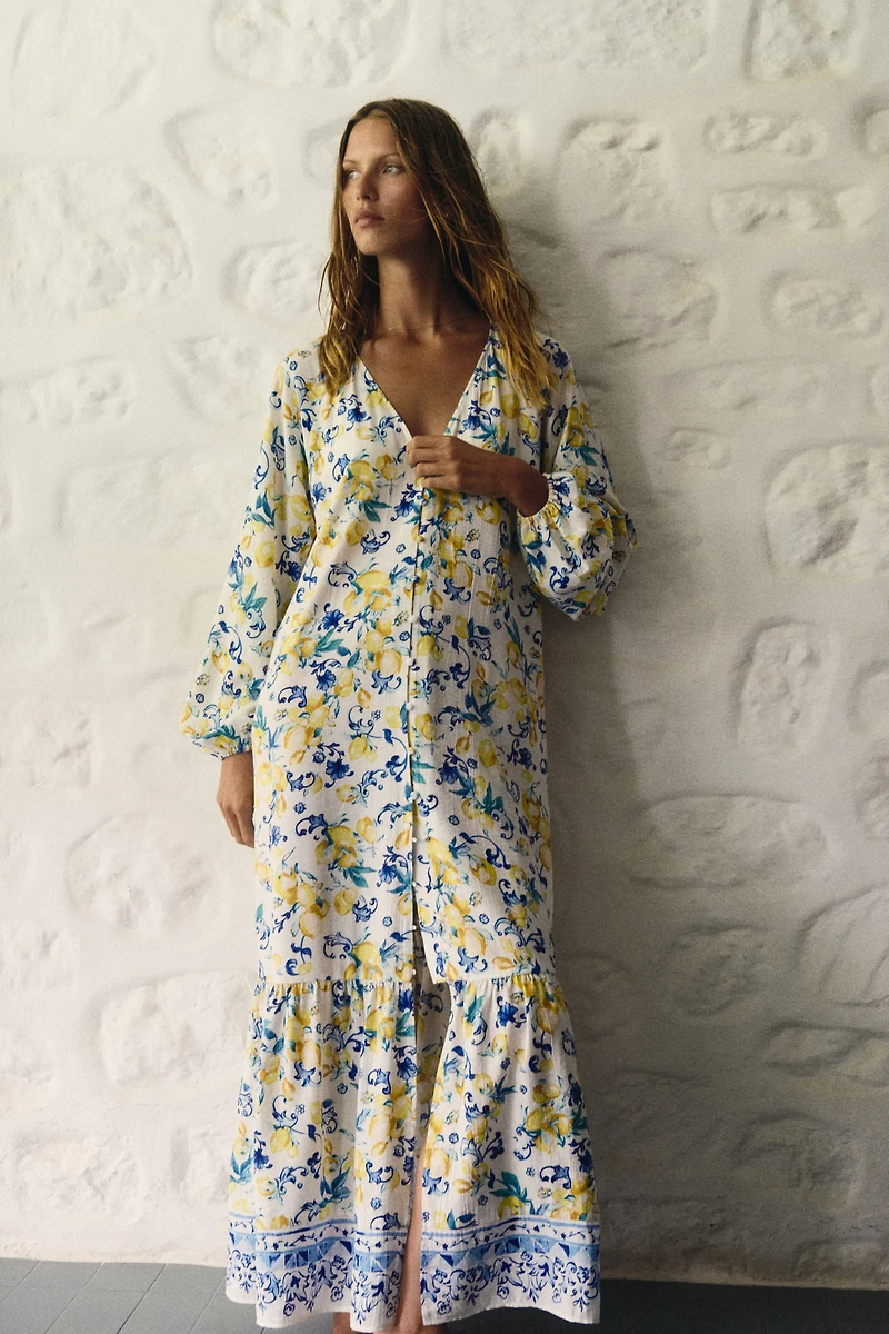 Robe en crêpe avec ceinture à nouer