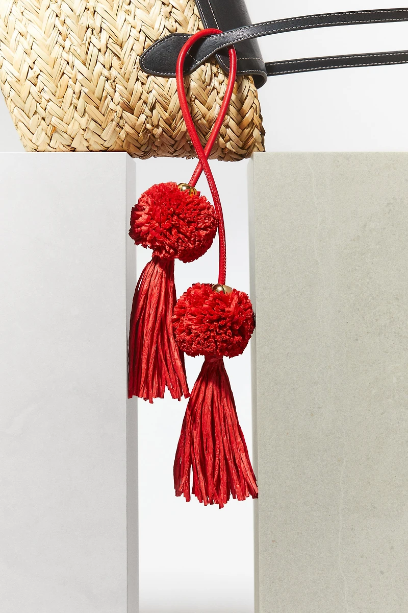 Décoration de sac avec gland en paille