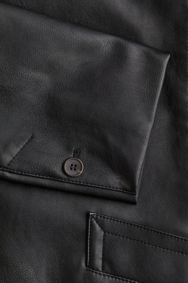 Veste en tissu enduit
