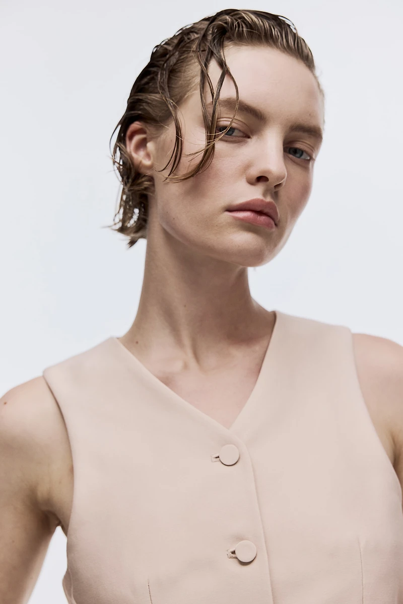 Chandail sans manches avec encolure en V et basque