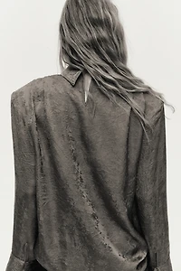 Blouse à épaulettes
