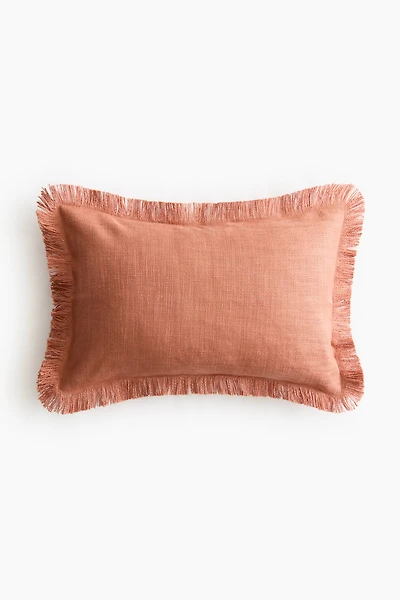 Housse de coussin en tissu flammé