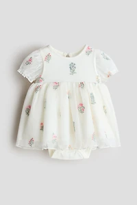 Robe cache-couche en tulle brodé