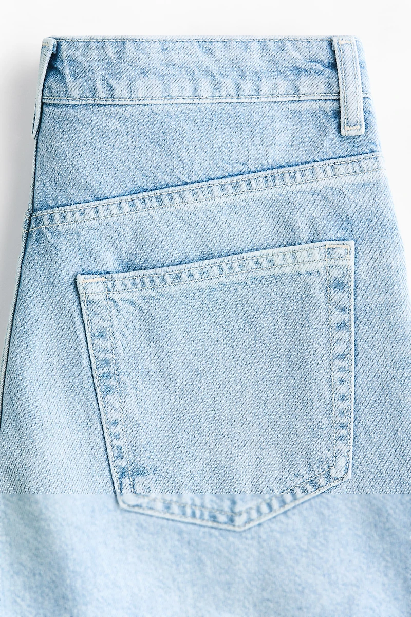 Raw-edge denim shorts