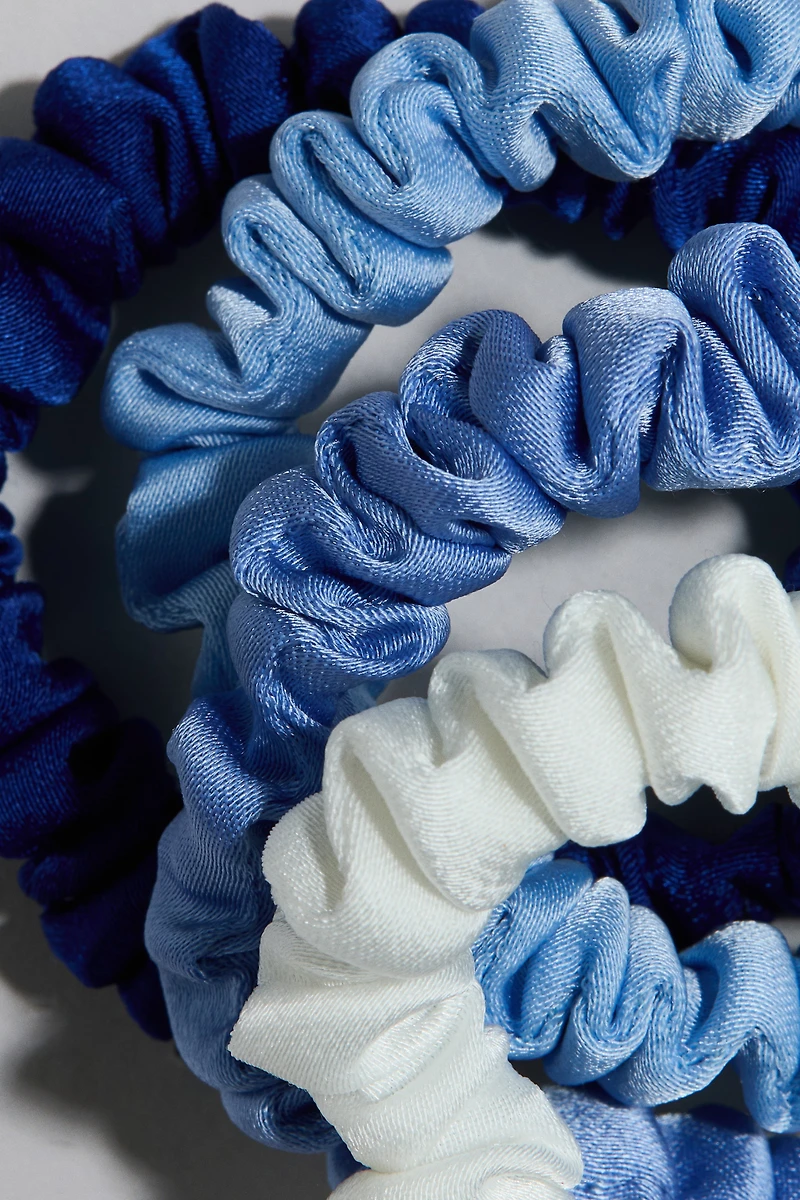 Lot de 4 cache élastiques